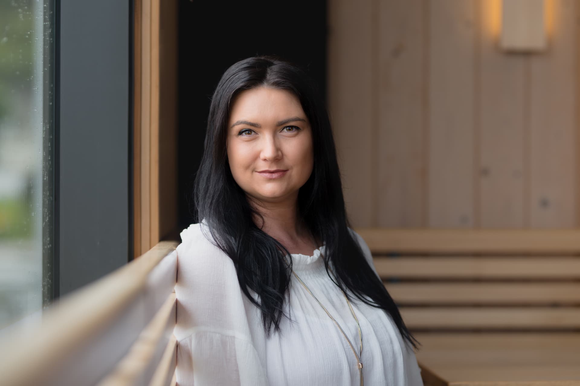 Megan Frost, founder of BrandLaunch Blueprint, in a product workspace